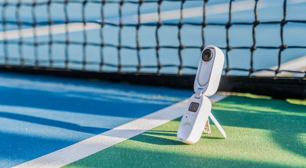 Insta360 GO 2 Charge Case on Tennis Court