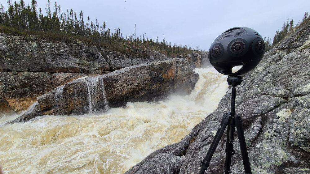 Insta360 Titan on the rocks next to a rushing river. Shooting for the immersive virtual reality experience.