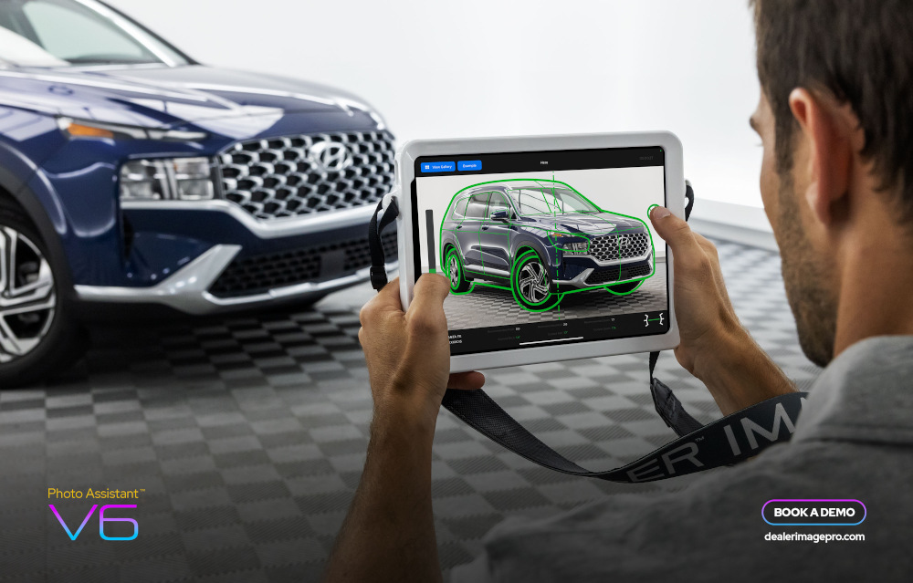 Photographer using an iPad with Photo Assistant to improve car dealership photography