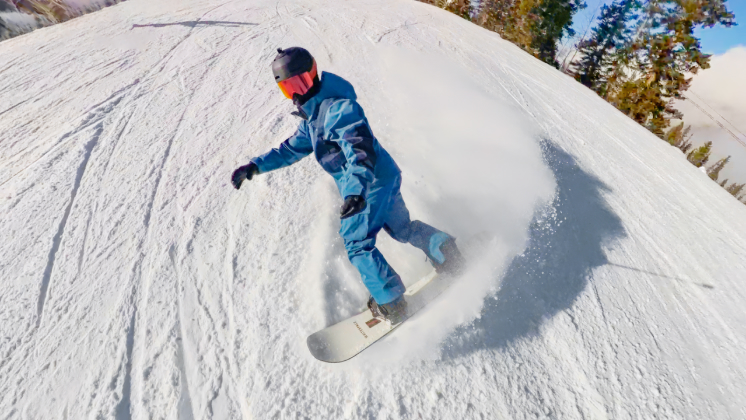 Shaun White pictured using selfie stick as he shreds down the mountain.