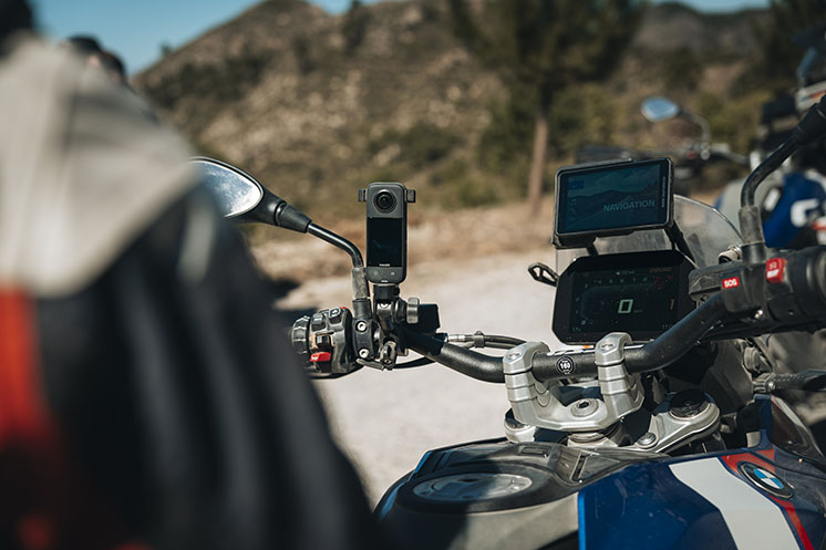 An Insta360 X4 mounted on a BMW bike.