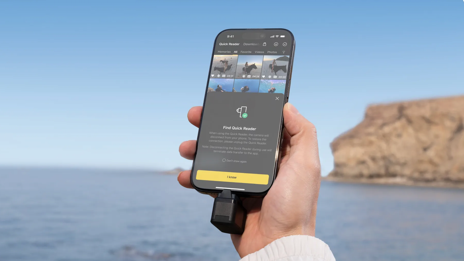 Insta360 quick reader connected to smartphone for fast file transfer