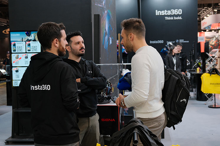 Insta360 staff talk to EICMA attendees.