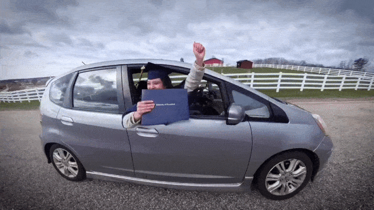 A GIF image showing a car exterior and skateboarder as they hold their diploma.