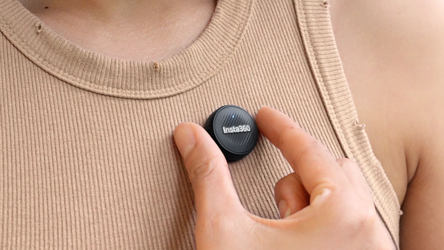 close-up of Insta360 X5 Mic Air accessory clipped to a shirt