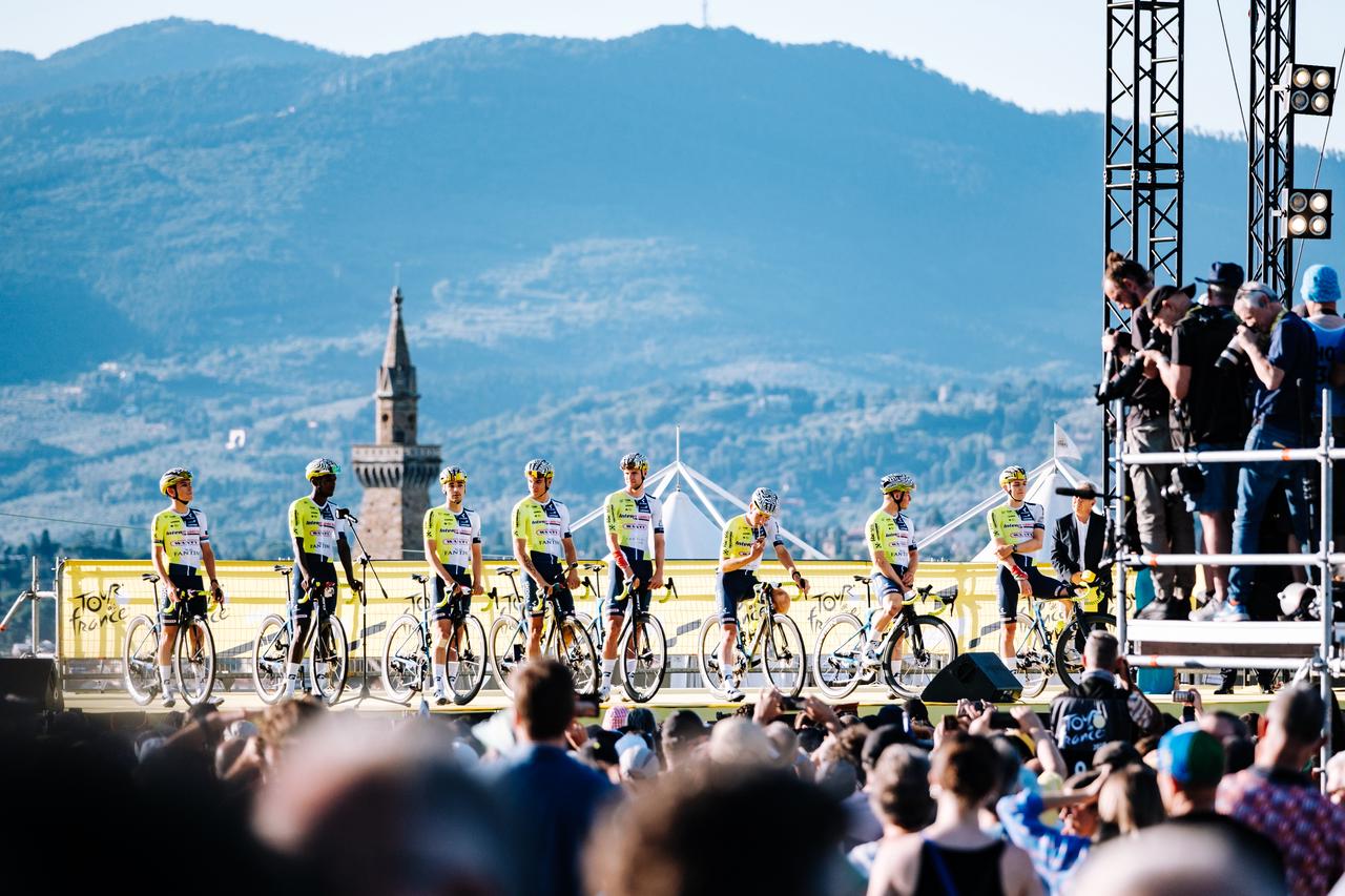 Riders pose for Tour de France event.