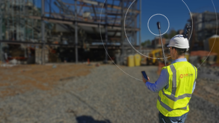 Evercam employee using Insta360 X5 in the field.