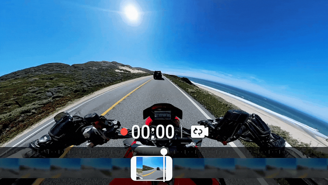 POV of a motorcycle on a beach road with recorded footage being deleted as it reaches 30 minutes.