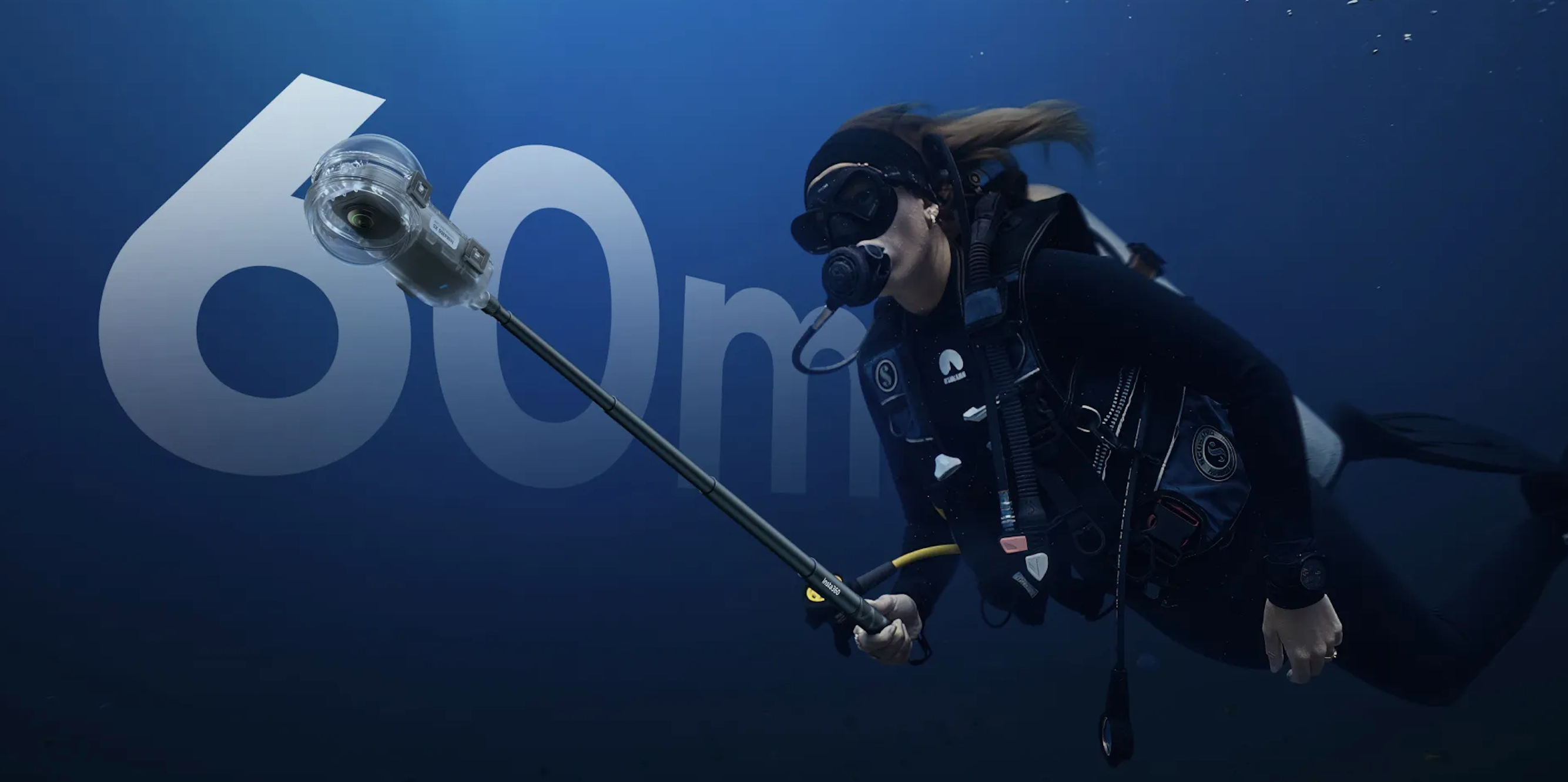 diver filming underwater with Insta360 X5 dive case at 60m depth