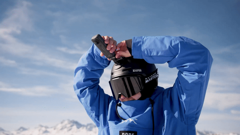 skier wearing a helmet with Insta360 X5 action camera
