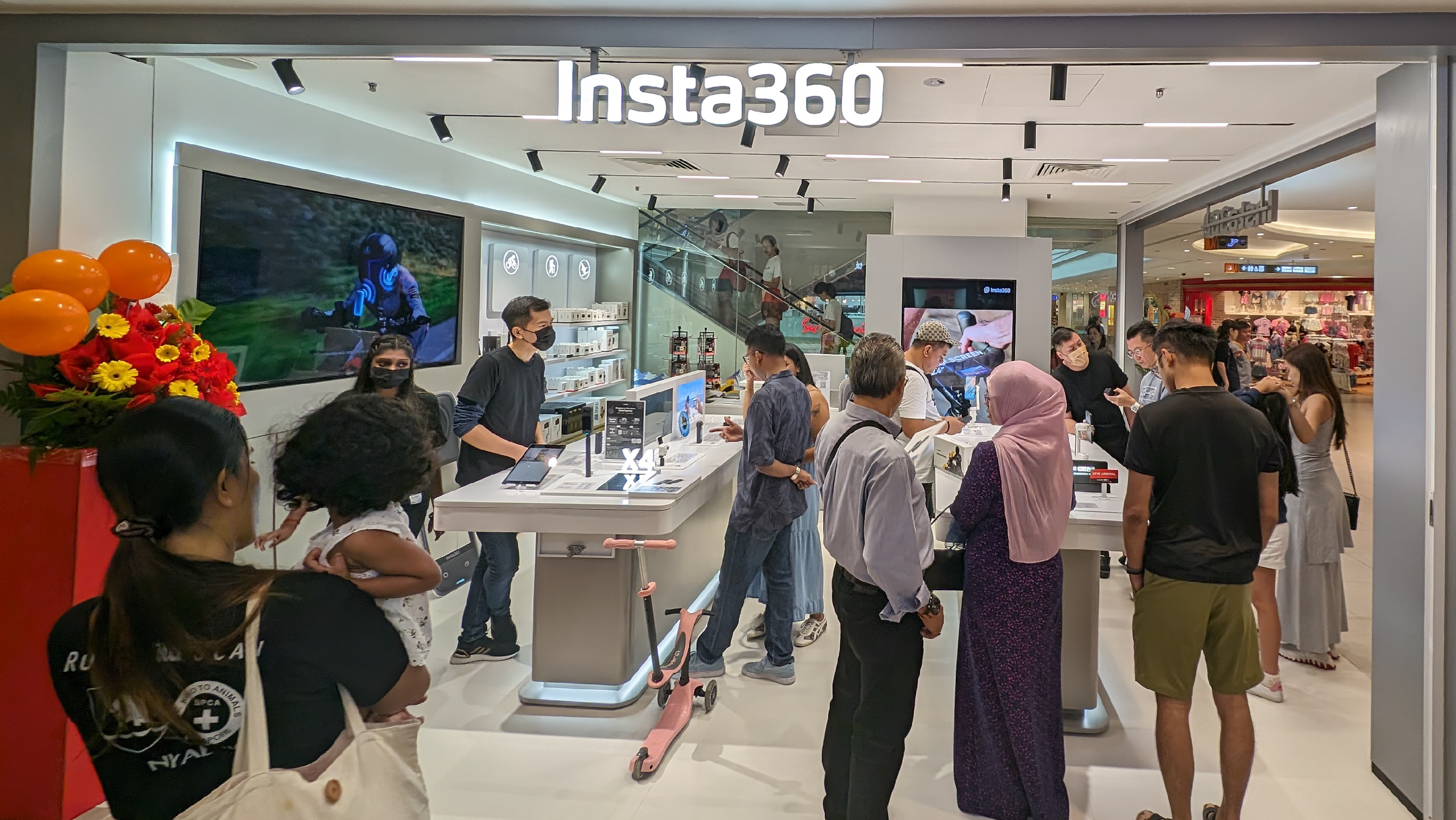 Crowds gather at Singapore's first Insta360 store.