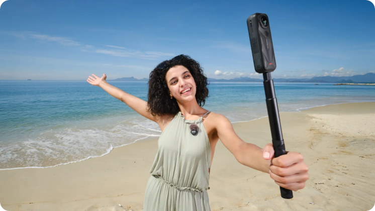 Woman solo traveling using Insta360 X5 Ultimate Creator Bundle, featuring Invisible Selfie Stick and Mic Air to shoot a video