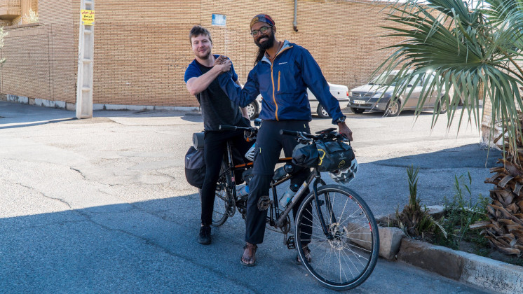 Kumar and a participant with his tandem bike